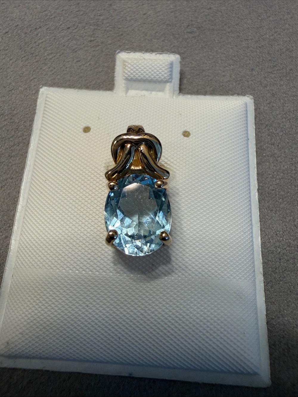 Gold over silver blue topaz pendant. GUC.
